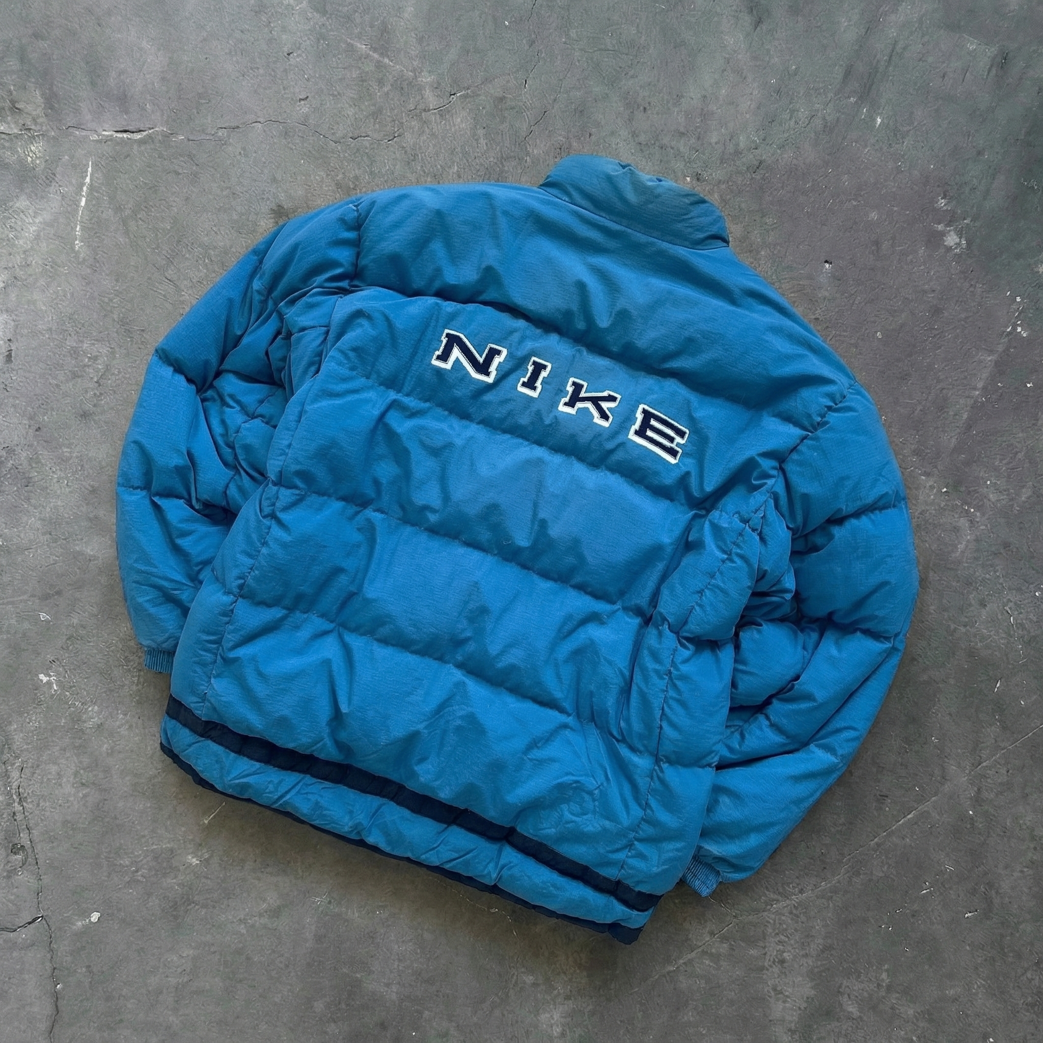 Nike Spellout Puffer Jacket blue